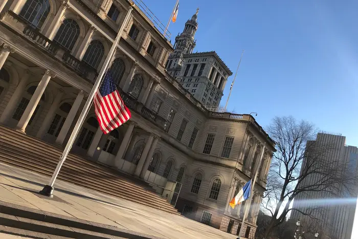 Flags flown at half staff at City Hall and other city government buildings ion honor of fallen officer Jason Rivera.